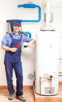 Picture of a man working on a water heater.